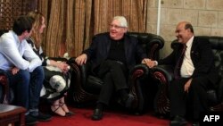 Martin Griffiths, center, the U.N. special envoy for Yemen, is pictured at Sanaa international airport, Nov. 21, 2018.