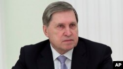 یوری ئۆشاکۆڤ، ڕاوێژکاری کرملین