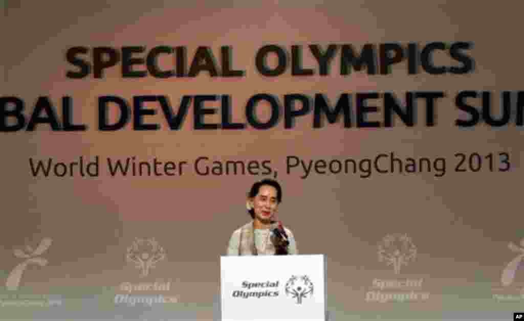 Myanmar opposition leader Aung San Suu Kyi speaks at the Global Development Summit during the 10th Special Olympics World Winter Games in Pyeongchang, South Korea, Wednesday, Jan. 30, 2013. South Korea began showing off its new snow sports mecca with th