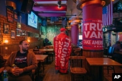 Supporters of Republican presidential nominee former President Donald Trump gather on U.S. election day to watch results roll at a bar in Jerusalem, Nov. 6, 2024.