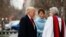Rev. Luis Leon greets President-elect Donald Trump and his wife Melania as they arrive for a church service at St. John’s Episcopal Church across from the White House in Washington, Jan. 20, 2017, on Donald Trump's inauguration day.