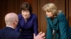 Homeland Security Secretary Alejandro Mayorkas, left, talks with Sen. Susan Collins, R-Maine, center, and Sen. Lisa Murkowski, R-Alaska, right, during a break of the Senate Appropriations committee hearing to examine domestic extremism, May 12, 2021.