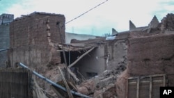 A damaged apartment building is seen after heavy rainfall flooded Tagounite, Zagora province, southern Morocco, Sept. 7, 2024. 