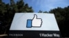 FILE - In this April 14, 2020, file photo, the thumbs up Like logo is shown on a sign at Facebook headquarters in Menlo Park, Calif. The Supreme Court has sided with Facebook in a lawsuit over unwanted text notifications it sent, rejecting a claim…