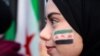 Syrian-Americans and supporters celebrate after Syrian rebels announced that they had ousted Syrian President Bashar al- Assad in Syria, in Dearborn, Michigan,