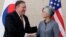 U. S. Secretary of State Mike Pompeo, left, shakes hands with South Korean Foreign Minister Kang Kyung-wha at South Korea's mission, July 20, 2018 in New York.