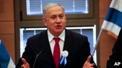 Israeli Prime Minister Benjamin Netanyahu speaks during his party's faction meeting in Jerusalem, Oct. 3, 2019.