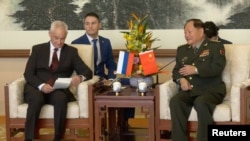 Andrei Belousov, Russia's defence minister, attends a meeting with Zhang Youxia, vice chairman of China's Central Military Commission, in Beijing, in this still image taken from video, Oct. 15, 2024. (Russian Defense Ministry/Handout via Reuters)