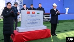 In this handout photo taken and released by the Kyrgyz presidential press office on Dec. 27, 2024, officials attend the commencement ceremony of the China-Kyrgyzstan-Uzbekistan railway project in Tash-Kitchu, Jalal-Abad region, in southern Kyrgyzstan.