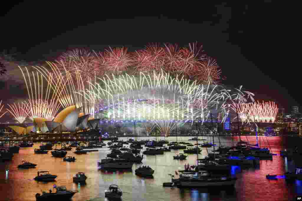 Fireworks explode over the Sydney Opera House and Harbour Bridge during New Year's Eve celebrations in Sydney, Australia, Dec. 31, 2024.