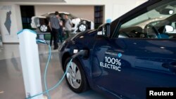 FILE - An electric car is displayed in Tel Aviv, Oct. 10, 2012. 