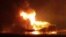 A video image from news station Noticias Ciudad del Carmen shows a fire burning at an oil platform in the Gulf of Mexico along the Mexican coast before sunrise, April 1, 2015.