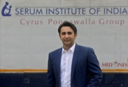 FILE - Adar Poonawalla, Chief Executive Officer (CEO) of the Serum Institute of India poses for a picture at the Serum Institute of India, Pune, India, Nov. 30, 2020.