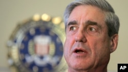 FILE - Former FBI director Robert Mueller.