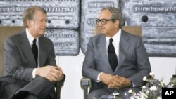 FILE - Then Presidents Jimmy Carter, left, of the United States and Yitzhak Navon of Israel meet in Jerusalem, March 11, 1979. Navon, who served as Israel's fifth president, died Nov. 7, 2015, his family said. He was 94. 