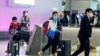 مسافران چینی در فرودگاه بین‌المللی لس آنجلس