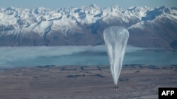 This handout photo taken on June 15, 2013 and received from Google on June 16 shows a Project Loon high altitude ballon sailing over Tekapo in Southern New Zealand.