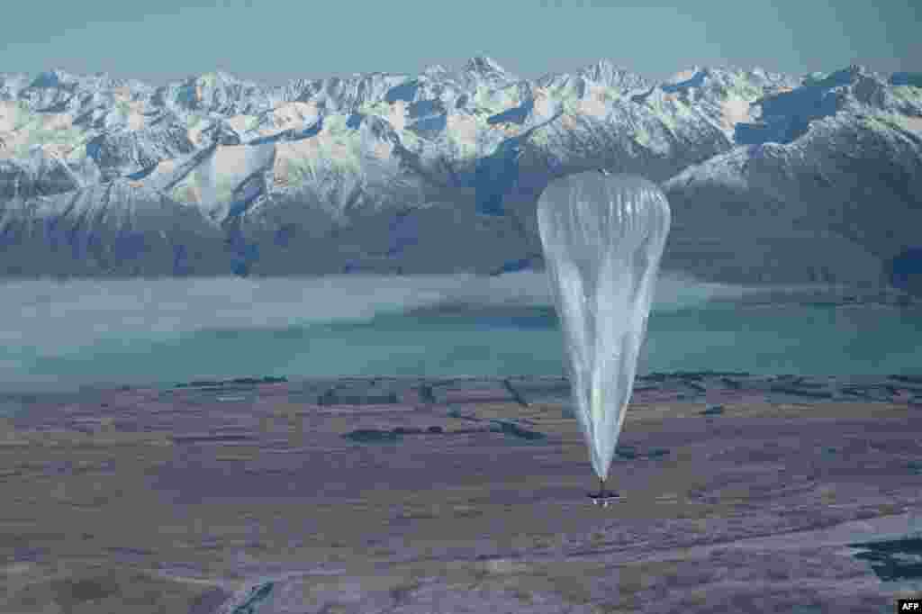 This handout photo received from Google shows a Project Loon high altitude ballon sailing over Tekapo in Southern New Zealand after its launch. Google revealed top-secret plans to send balloons to the edge of space with the lofty aim of bringing Internet to the two-thirds of the global population currently without web access.