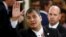 FILE - Ecuador's President Rafael Correa waves as he arrives for the taking office ceremony of Argentina's President Mauricio Macri at Casa Rosada Presidential Palace in Buenos Aires, Argentina, Dec.10, 2015.