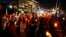Supporters of former Brazilian president Luiz Inacio Lula da Silva attend a vigil outside the Federal Police Superintendence in Curitiba, Brazil, Aug. 31, 2018.