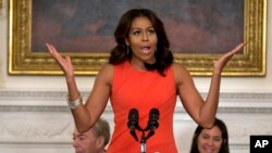 First lady Michelle Obama speaks during the Broadway at the White House event for high school students involved in performing arts programs in the State Dining Room of the White House in Washington, Nov. 16, 2015.