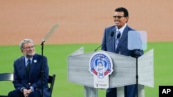 FILE - Former Los Angeles Dodgers pitcher Fernando Valenzuela speaks during his jersey retirement ceremony before the baseball game between the Dodgers and the Colorado Rockies, in Los Angeles, Aug. 11, 2023.