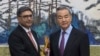 In this image taken from a video footage run by Phoenix TV, Chinese Foreign Minister Wang Yi, right, meets with India's Foreign Secretary Vikram Misri in Beijing, Jan. 27, 2025. (Phoenix TV via APTN)