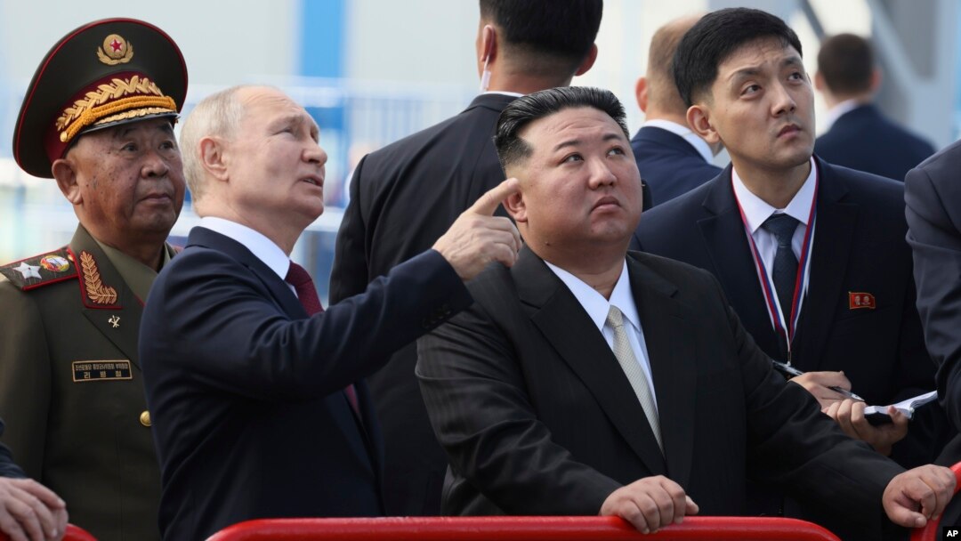 Russian President Vladimir Putin and North Korea's leader Kim Jong Un examine a launch pad during their meeting at the Vostochny cosmodrome outside the city of Tsiolkovsky, on Wednesday, Sept. 13, 2023. (Mikhail Metzel, Sputnik, Kremlin Pool Photo via AP)