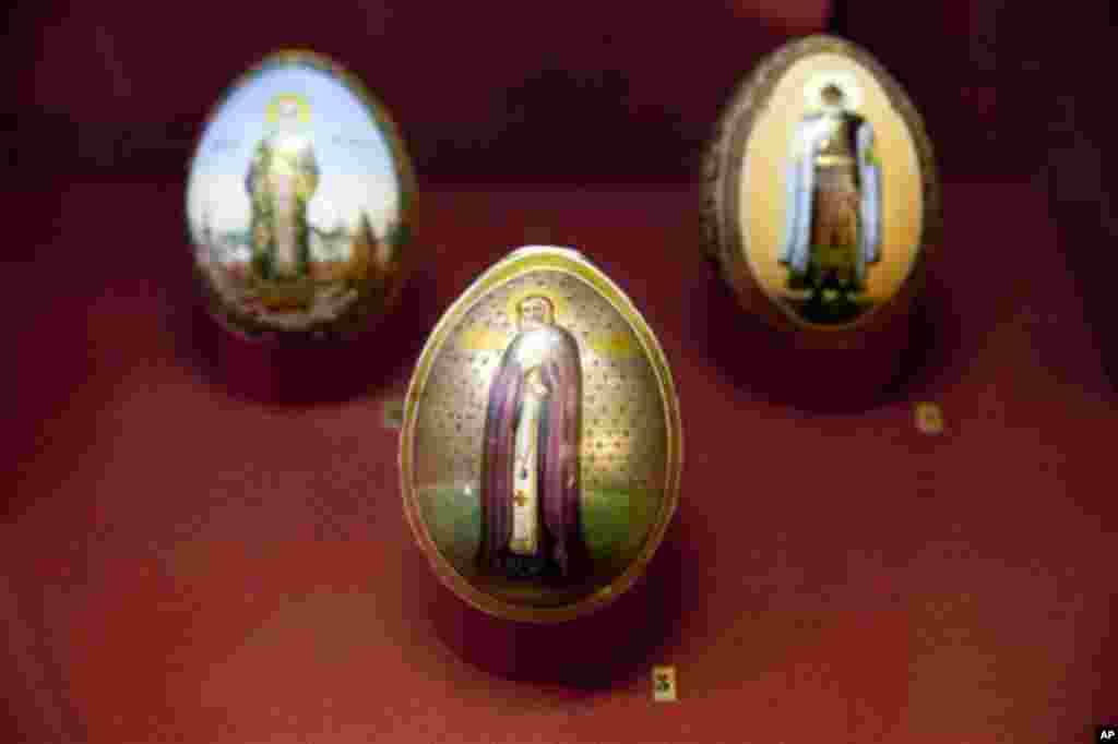 An Easter egg showing Saint Seraphim of Sarov made in 1903, is on display at the Imperial Easter eggs exhibition in the Historical Museum in Moscow, Russia, Friday, April 11, 2014. The exhibition of Easter eggs linked to the Russian Emperor family opened 