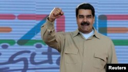 Venezuela's President Nicolas Maduro gestures during a meeting with supporters in Caracas, March 31, 2017. (Miraflores Palace/Handout)