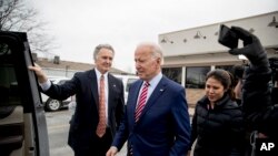 Democratic presidential candidate Joe Biden leaves after eating lunch at a restaurant in Bettendorf, Iowa, Jan. 6, 2020.