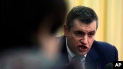 FILE - Russian lawmaker Leonid Slutsky speaks during a press conference in Simferopol, Crimea, Ukraine, Feb. 25, 2014.