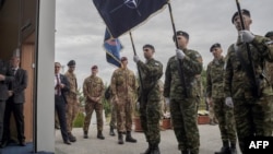 Members of the NATO-led peacekeepers in Kosovo attend the change-of-command ceremony in Pristina on Oct. 11, 2024. U.S. Navy Admiral Stuart B. Munsch said on Oct. 12 that ethnic tensions in north Kosovo could flare into violence that endangers the peacekeepers.