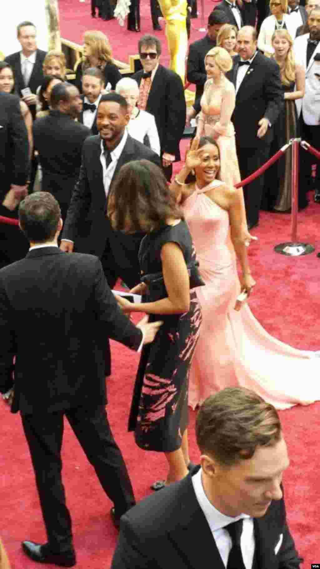 Will Smith, Jada Pinket-Smith, Benedict Cumberbatch di red carpet Academy Awards ke-86, Dolby Theater, Los Angeles, California, 2 Maret 2014.