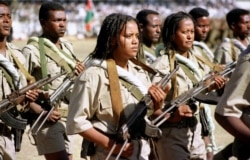 FILE - Young soldiers parade in Asmara during Eritrea's Independence Day celebrations.