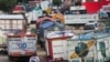 Trucks are parked near a barricade set up by supporters of Bolivia’s former President Evo Morales on one of the main highways, obstructing the supply of food and fuel in Mairana, Bolivia October 30, 2024.