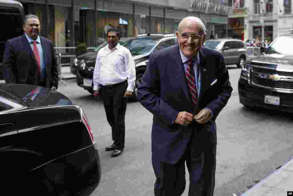 Former New York mayor Rudy Giuliani arrives at Trump Tower Saturday.