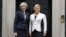 Britain's Prime Minister Theresa May, left, welcomes President Kolinda Grabar-Kitarovic of Croatia to No 10 Downing Street in London, Oct. 11, 2016.