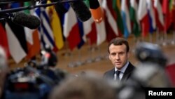 French President Emmanuel Macron arrives to attend the EU summit in Brussels, Belgium, Dec. 14, 2017.