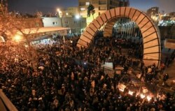 FILE -Iranian students demonstrate following a tribute to the victims of a Ukraine International Airlines crash, in front of Amirkabir University in Tehran, Jan. 11, 2020.