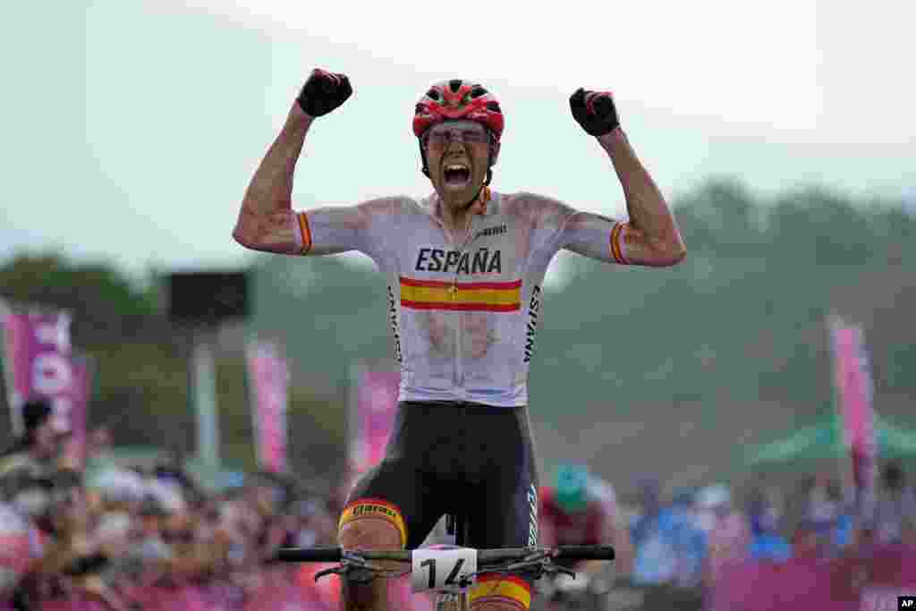David Valero Serrano of Spain reacts as he wins the bronze medal during the men's cross country mountain bike competition at the 2020 Summer Olympics in Izu, Japan.
