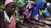 Pupils attend a koranic school in the town of Small Sefoda in eastern Sierra Leone, April 22, 2012.