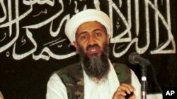 FILE - In this 1998 file photo made available on March 19, 2004, Osama bin Laden is seen at a news conference in Afghanistan. 