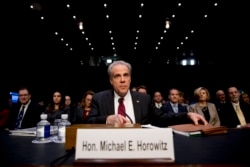 FDepartment of Justice Inspector General Michael Horowitz arrives for a Senate Judiciary Committee hearing on the Inspector General's report on alleged abuses of the Foreign Intelligence Surveillance Act, Dec. 11, 2019.