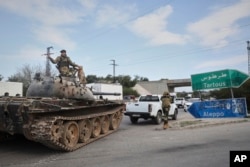 Reinforcement Syrian security forces deploy in the outskirts of Latakia, Syria, March 7, 2025.