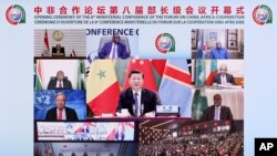 资料照片：中国国家主席习近平对中非合作论坛发表视频讲话（2021年11月29日）