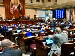 South Carolina lawmakers, seen here inside the House Chamber in Columbia, plan to adopt year-round daylight saving time if the move is authorized by Congress, May 9, 2019.