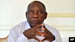 FILE - In this photo supplied by the South African Government Communications and Information Services (GCIS) newly-elected South African President Cyril Ramaphosa, prepares for his State of the Nation address, Feb. 16, 2018.