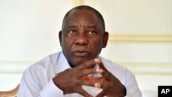 FILE: In this photo supplied by the South African Government Communications and Information Services (GCIS) newly-elected South African President Cyril Ramaphosa, prepares for his State of the Nation address, Feb. 16, 2018.