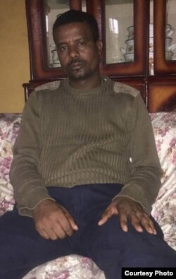 Kefyalew Tefera, at his sister's home in Addis Ababa, Ethiopia, says he wants to "see the rule of law prevail in Ethiopia." (Photo courtesy of Name Seriomo)
